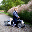 Enfant sur son Rider noir vintage Baghera